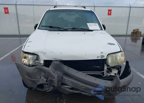 2001 Ford Escape Xlt z USA, uszkodzony, nr VIN 1FMYU03181KC55279